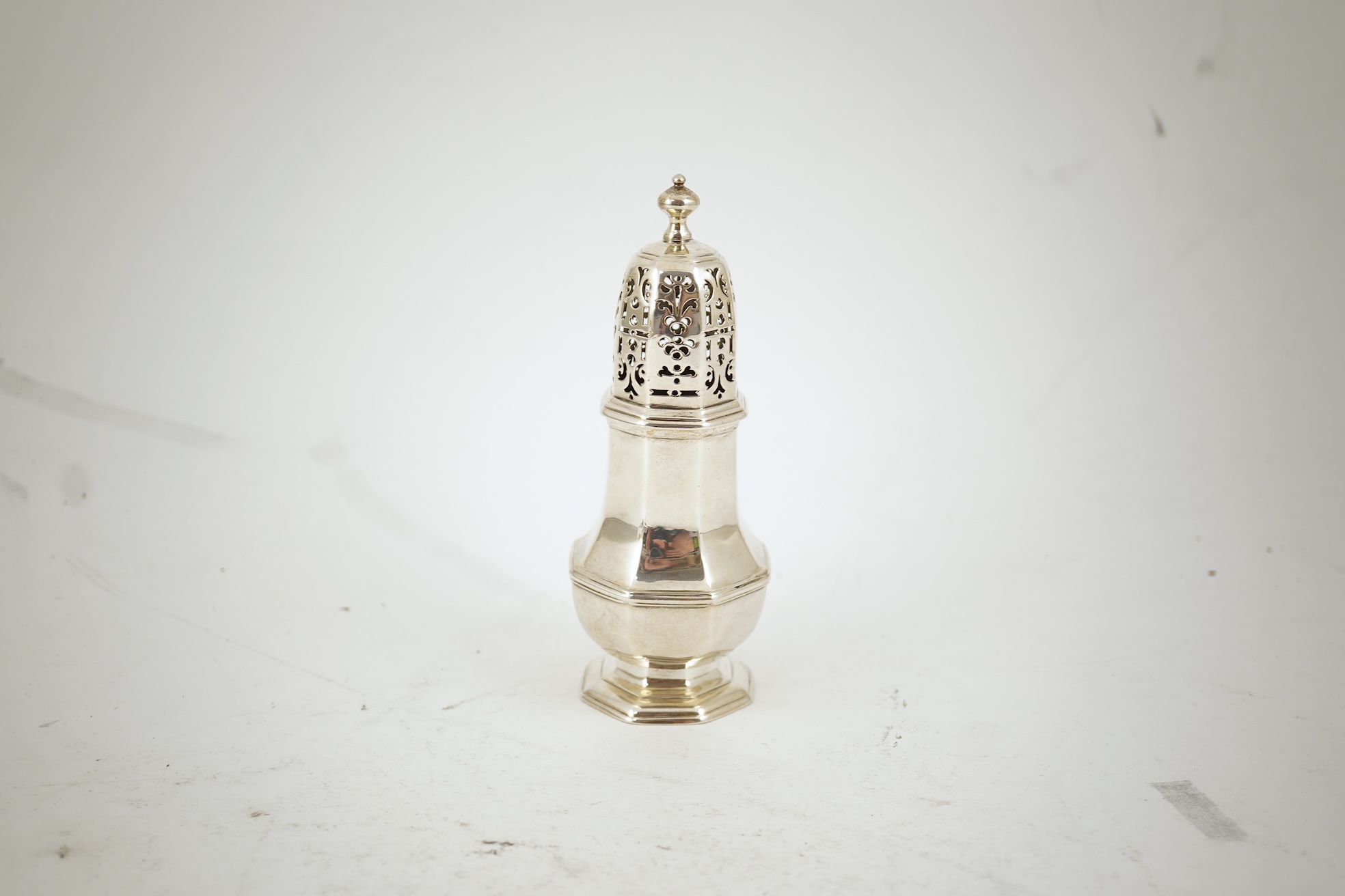 A late George I silver octagonal sugar caster, maker's mark overstruck by the date letter